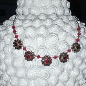 A Liz Palacios antiqued Swarovski necklace